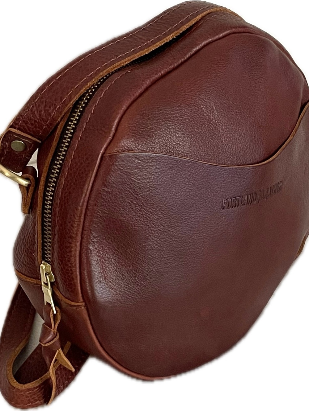 Portland Leather Full Grain Vachetta Leather Circle Crossbody Bag